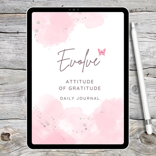 black tablet showing pink and white digital gratitude journal on grey and white desk next to a white stylus