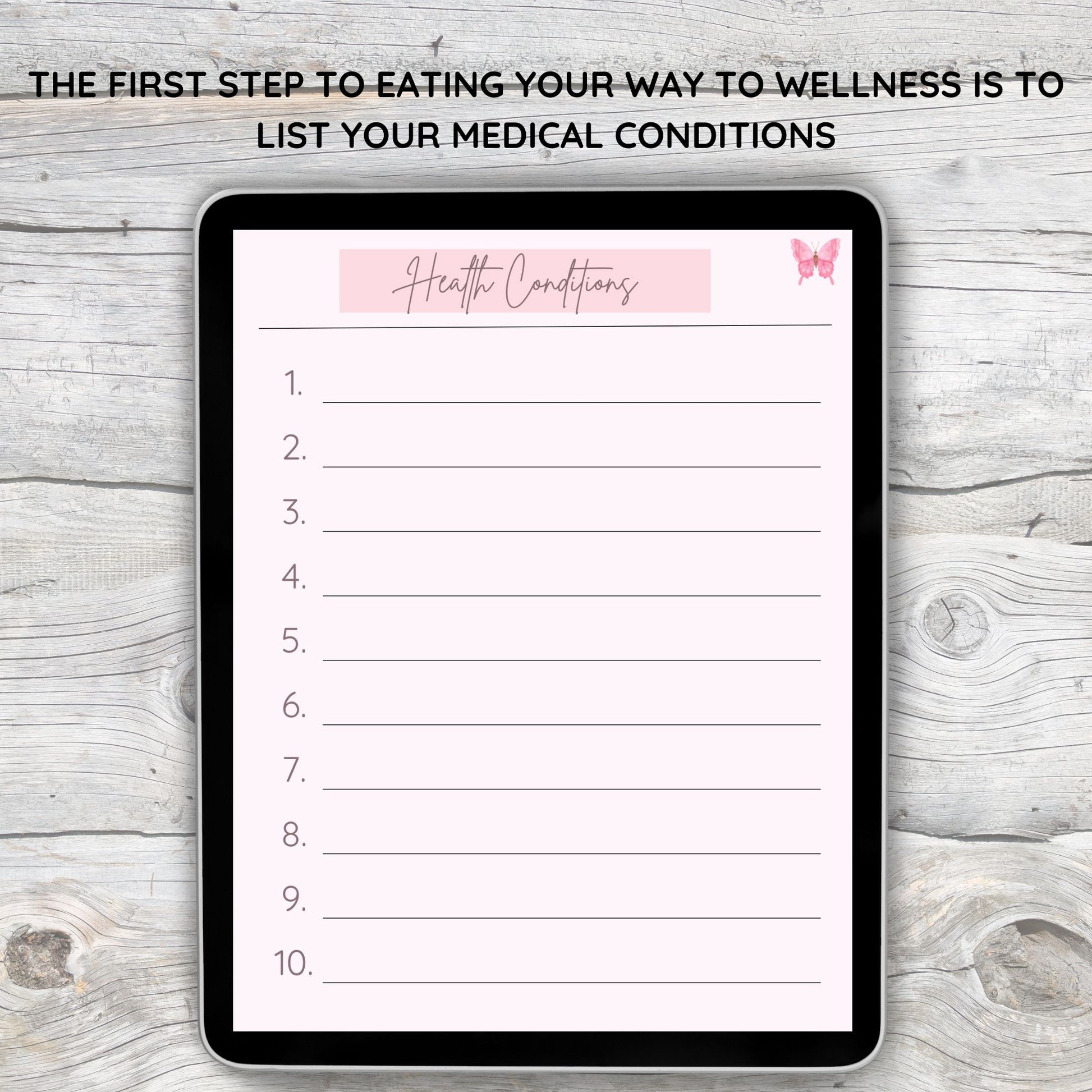 Black tablet laying on grey and white wooden desk.  Tablet displays pink digital page to list health conditions.