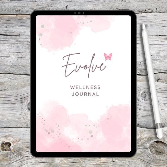 black tablet on grey and white wooden desk next to a white stylus.  Tablet displays pink and white digital wellness journal cover.